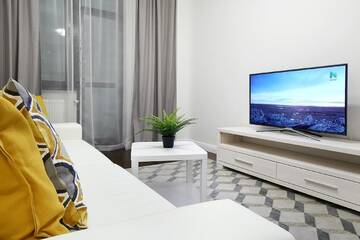 Фото номера Четырехместный номер «Премиум» Апартаменты BEST Apartments г. Гродно 15
