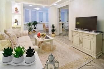 Фото номера Улучшенный четырехместный номер Апартаменты LIRA Apartments г. Гродно 10