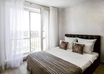 Фото номера Апартаменты с балконом Апартаменты MODERN Apartments г. Гродно 18