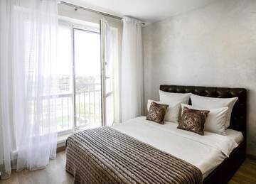 Фото номера Апартаменты с балконом Апартаменты MODERN Apartments г. Гродно 7