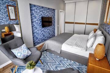 Фото номера Четырехместный номер Делюкс Апартаменты WOW Apartments г. Гродно 6