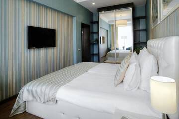 Фото номера Улучшенный четырехместный номер Апартаменты WOW Apartments г. Гродно 7