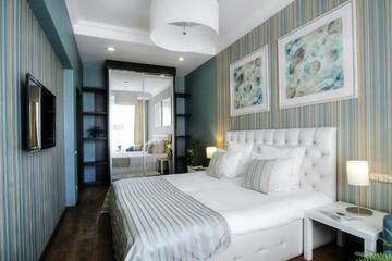 Фото номера Улучшенный четырехместный номер Апартаменты WOW Apartments г. Гродно 8