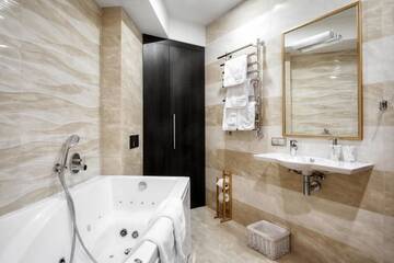 Фото номера Улучшенный четырехместный номер Апартаменты WOW Apartments г. Гродно 9
