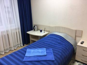 Фото номера Стандартный одноместный номер с общей ванной комнатой Отель Drive Hotel г. Гродно 3