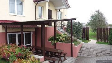 Фото номера Дом с 3 спальнями Дома для отпуска Usadba V Lapenkah г. Гродно 9