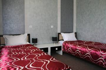 Фото номера Двухместный номер с 2 отдельными кроватями Отель Bruzgi г. Гродно 5