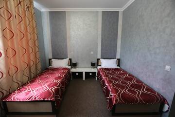 Фото номера Двухместный номер с 2 отдельными кроватями Отель Bruzgi г. Гродно 2